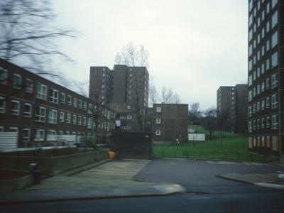 View of three 10-storey blocks amongst 3-storey developments