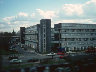 View of 6-storey blocks looking Southeast from train line View of Rowlett Street from Ackroyd Drive with Elmslie Point in background